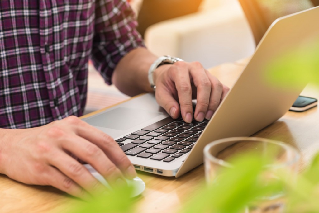 man using laptop