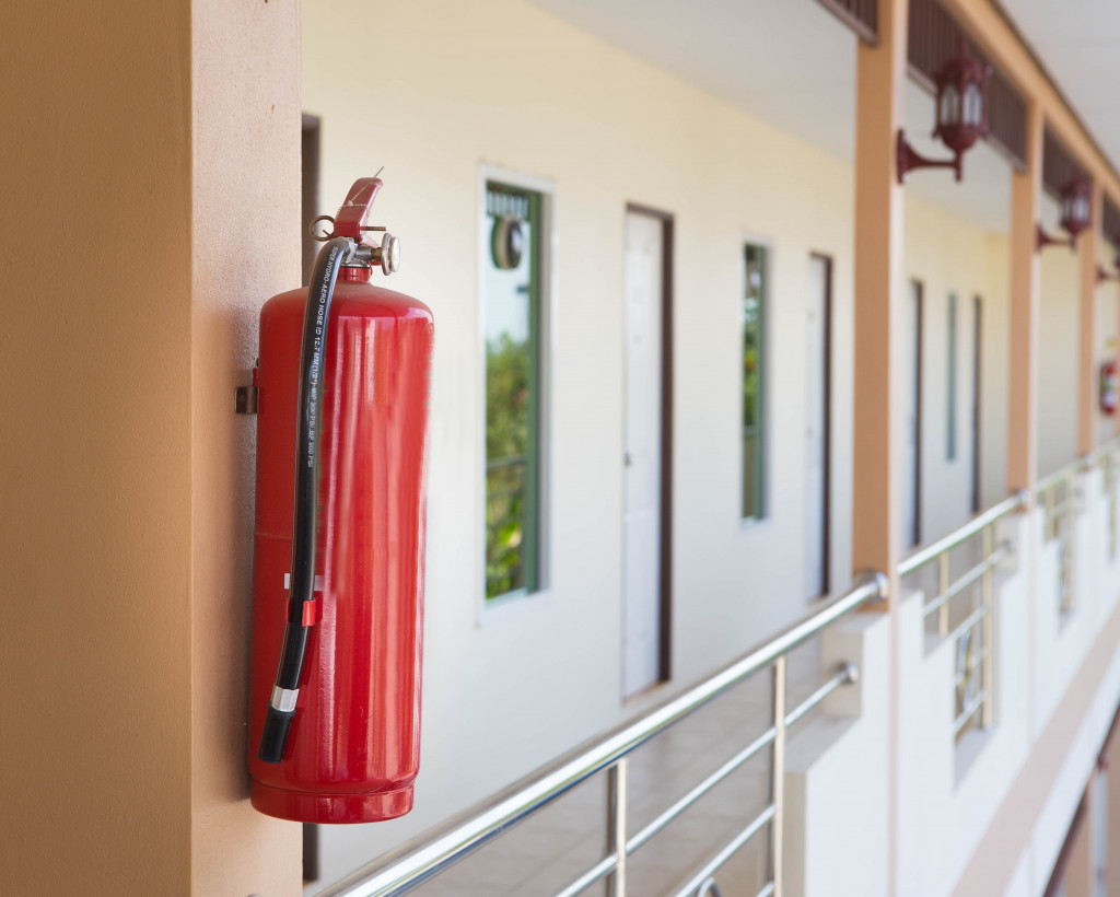 fire extinguisher mounted to a wall