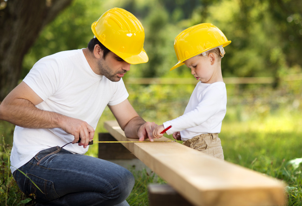 dad and son working together