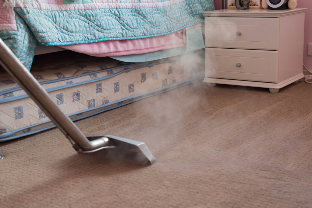 steam cleaning the carpet