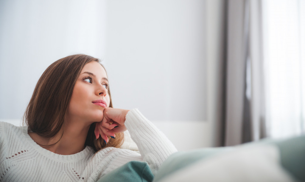 woman looking outside