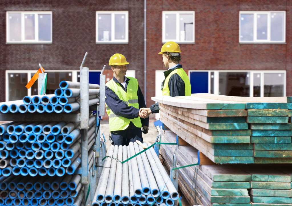 Construction workers wearing the necessary safety equipment