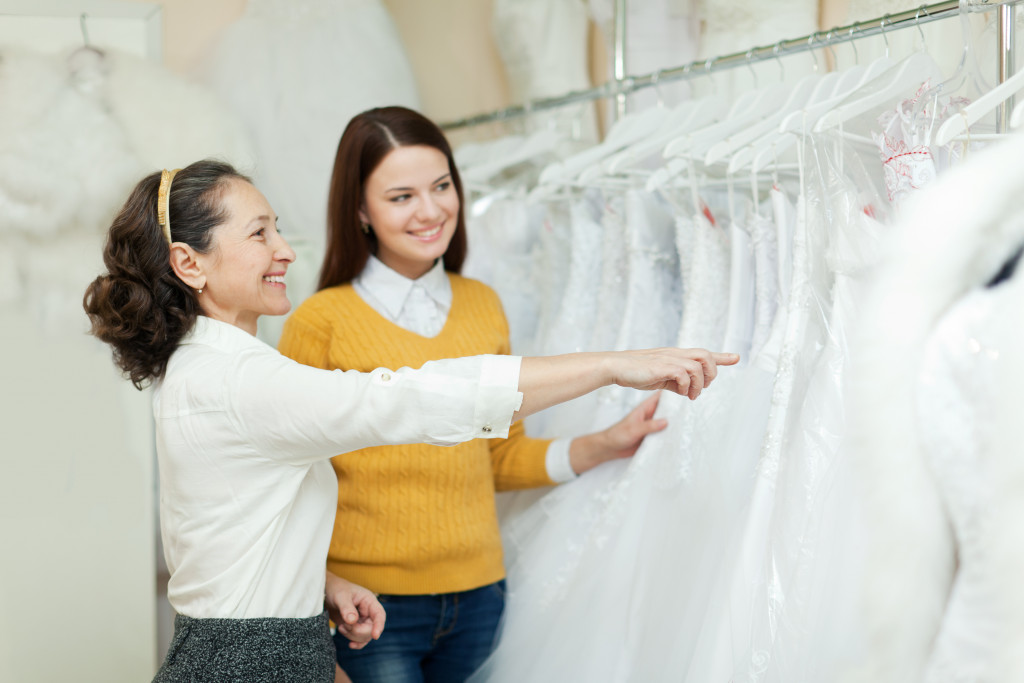 A bride-to-be shopping for a wedding dress