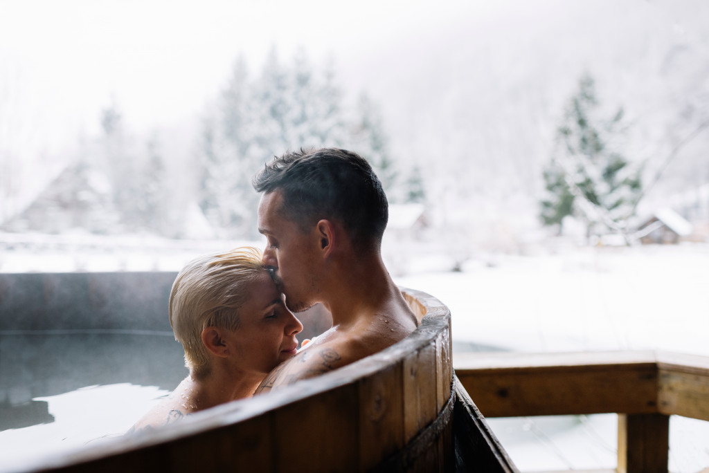 A couple in a hot bath in winter